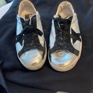 golden goose size 9 in decent condition small stain on interior